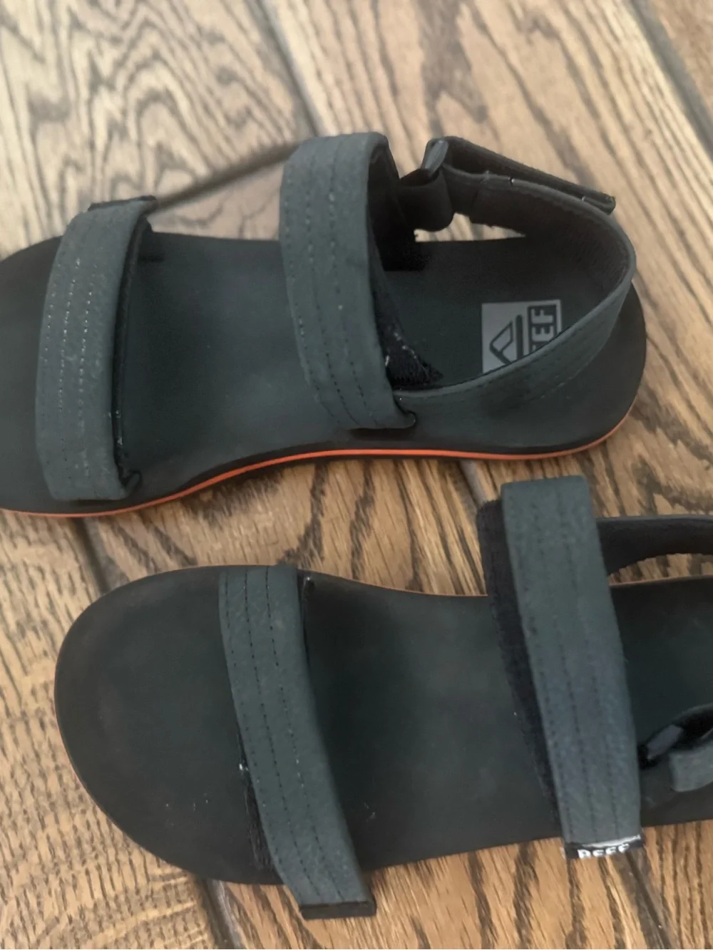 Size 4 Reef Kids Black and Orange Accent Strap Sandals